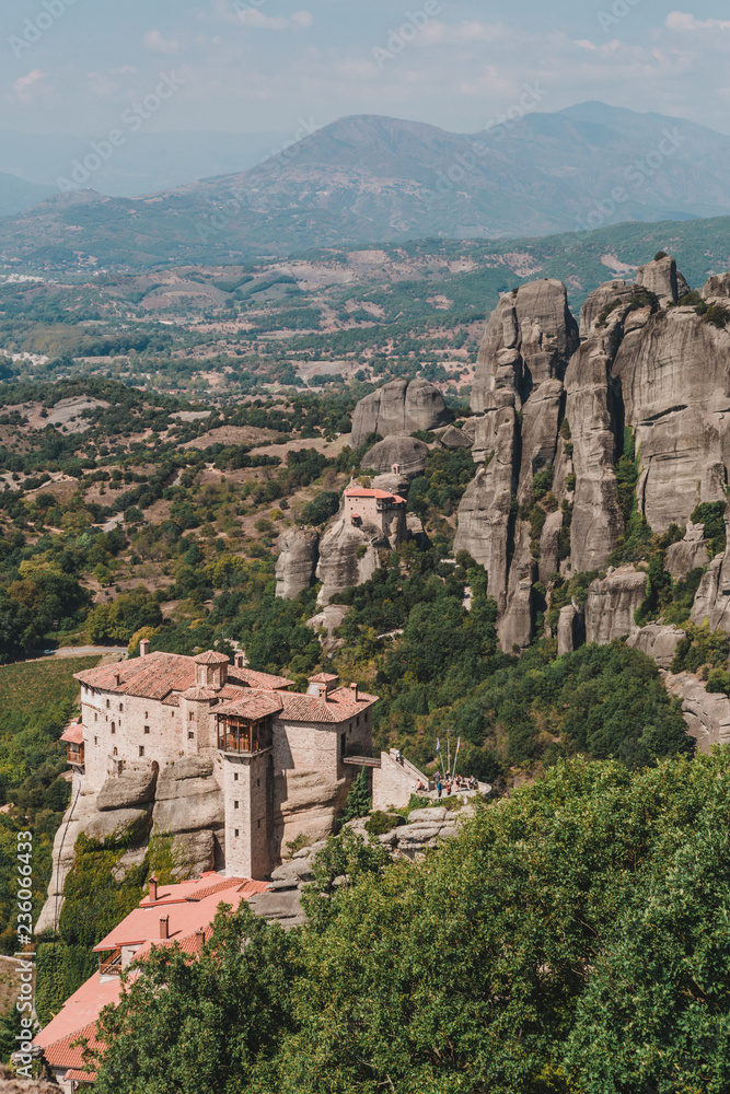Mountain scenery with Meteora rocks and Roussanou Monastery, landscape place of monasteries on the rock.