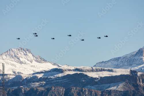 The Swiss Air Force flies with its helicopters a display in the Alps in the Bernese Oberland in Switzerland