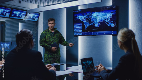 High-Ranking Military Man holds a Briefing to a Team of Government Agents and Politicians, Shows Satellite Surveillance Footage. 