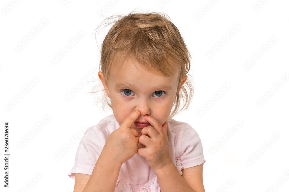 Baby girl is picking her nose with finger inside Baby girl is picking her nose with finger inside