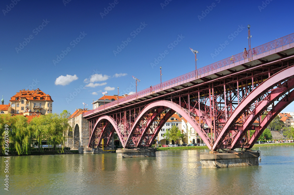 Slovenia, Maribor, The Old Bridge, also named the State Bridge, the Main Bridge and the Drava Bridge, is a bridge crossing the Drava River in Maribor, northeastern Slovenia.