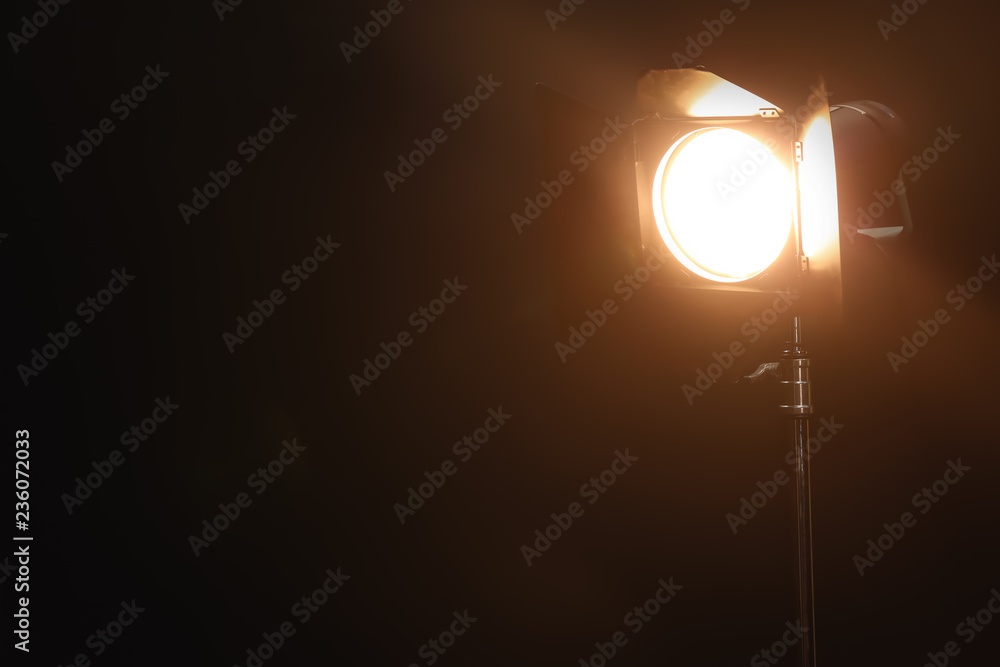 Professional lighting equipment on dark background Professional lighting equipment on dark background