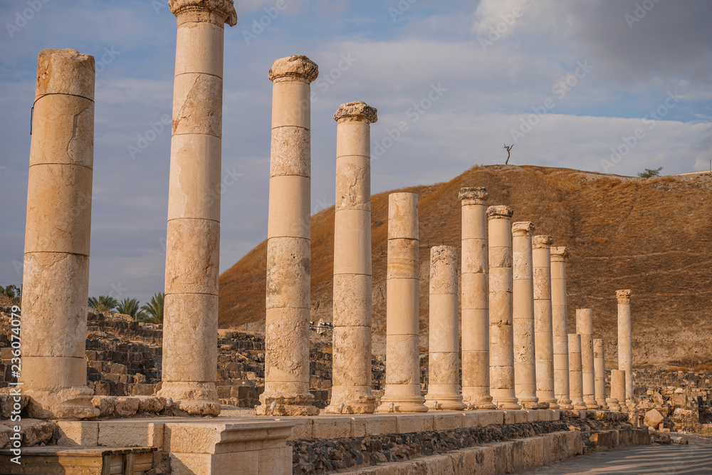 Ruins of the roman period in Beit She'An in Galilee in Israel, the hill on the background is the tell from the canaanite period