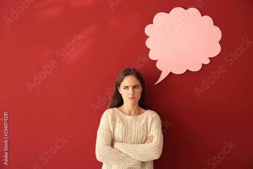 Displeased young woman near...