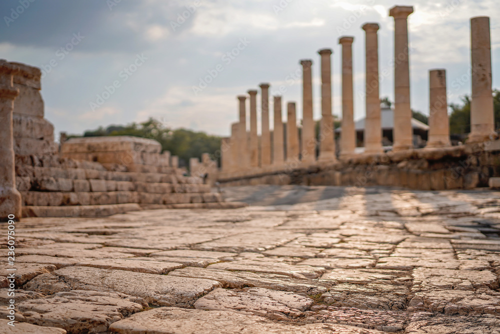 ancient street and columns in archaeological site Scythopolis, Beit Shean National Park, Jordan Valley, Israel. Ruins of the roman period
