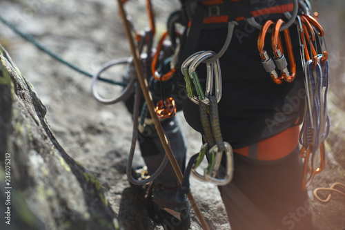 Climbing gear and equipment closeup. Tilt-Shift effect.