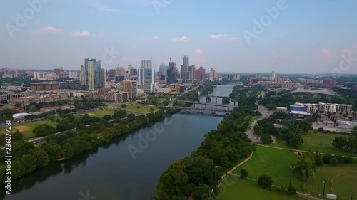 AERIAL: Slow push in on Austin, Texas on a beautiful sunny day. photo