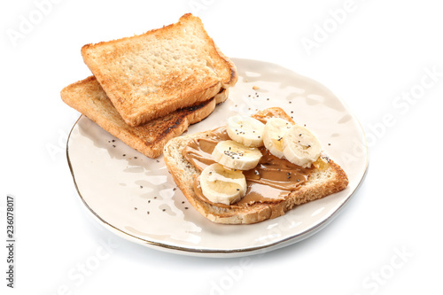Plate with sweet toasts on white background