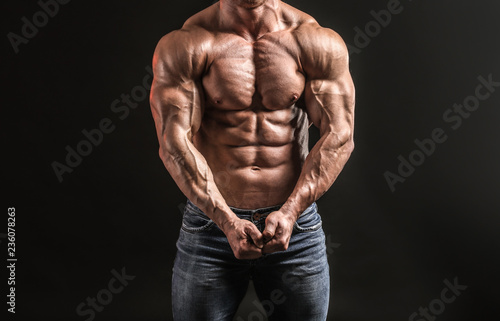 Muscular male torso with de...