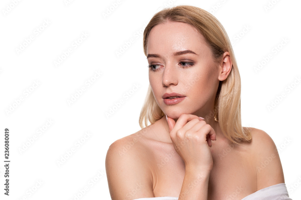 Beautiful face of young blond woman with clean fresh skin and natural make up on white background. Beautiful face of young blond woman with clean fresh skin and natural make up on white background.