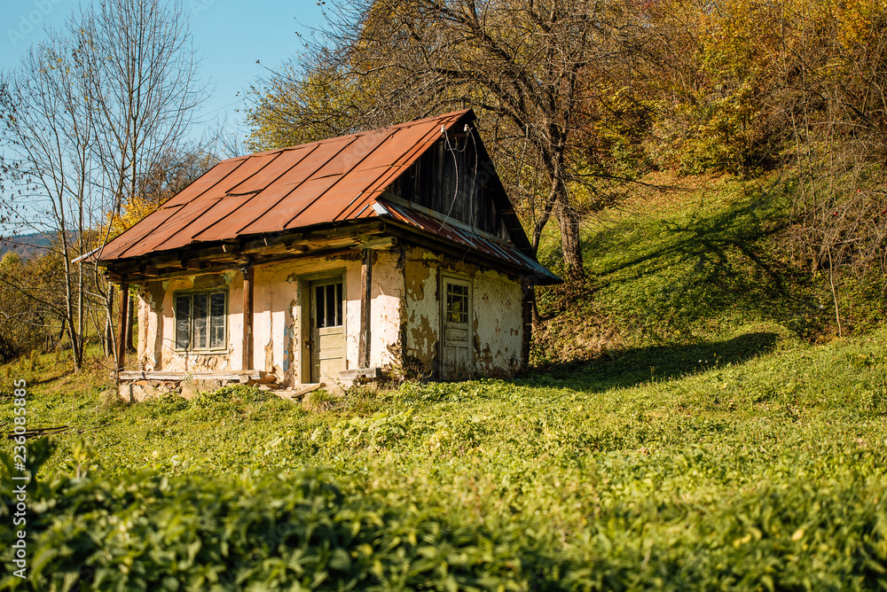 Old abandoned house in the countryside with broken roof and windows Old abandoned house in the countryside with broken roof and windows