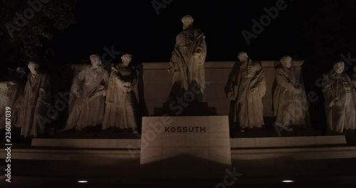 Kossuth Memorial on the Kossuth Square next to the Hungarian Parliament in Budapest at night. photo