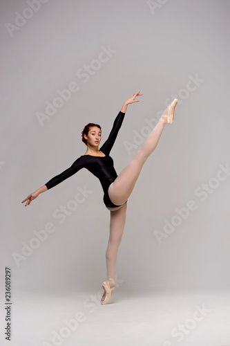 Elegant ballerina dancing in the studio. Young ballet dancer
