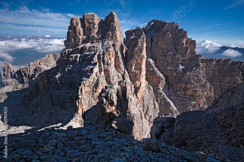 Mountaineers equipped face the "Bocchette Alte" ferrata in the Brenta group on the Dolomites, in Italy
