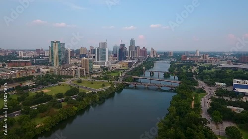 AERIAL: Drone flying towards Austin, Texas on a beautiful sunny day. photo