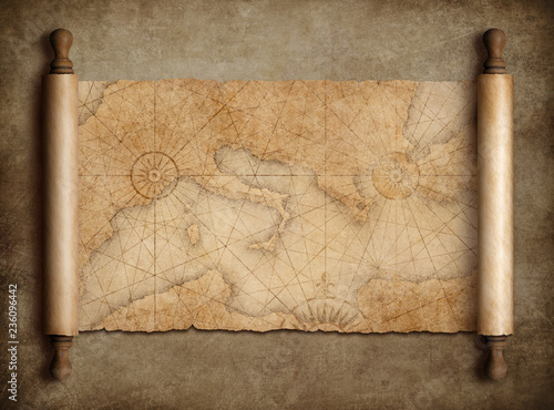 Photo Vintage medieval mediterranean map scroll on table