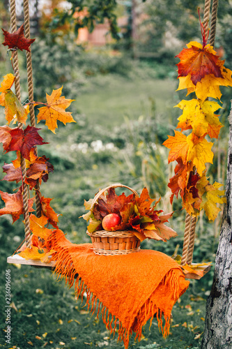 autumn bouquet on a swing in the garden