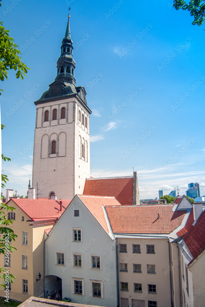 Beautiful old castle, view from the main entrance. Summer day. Beautiful old castle, view from the main entrance. Summer day.