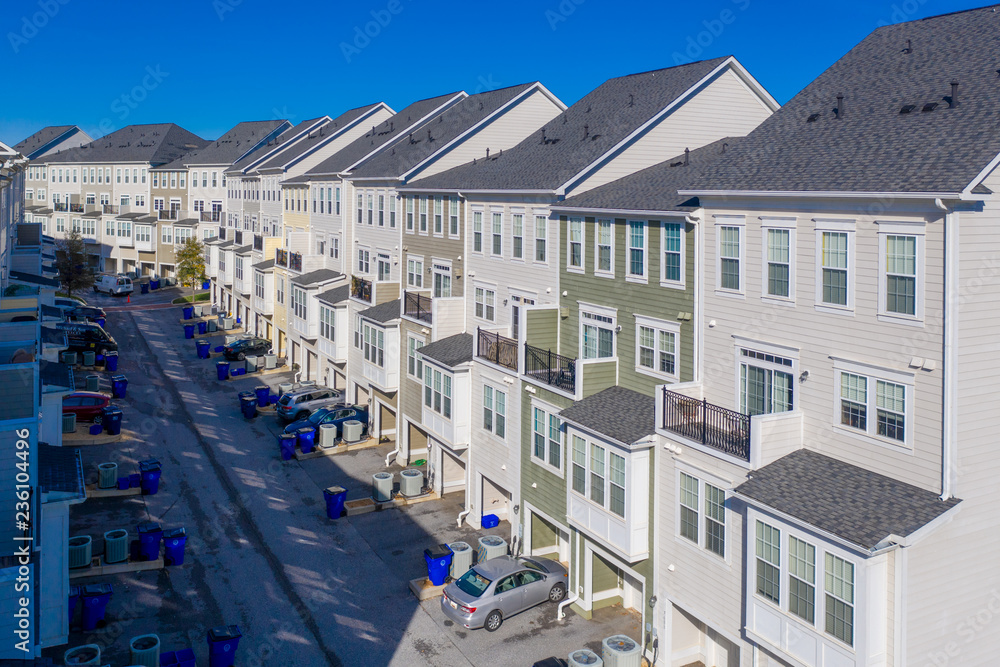Maple Lawn luxury multi storey town homes, town houses USA real estate with blue sky