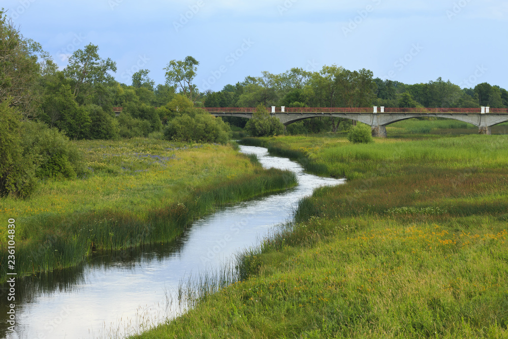Bridge over the kasari River in summer.