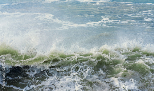 Splashing green sea wave