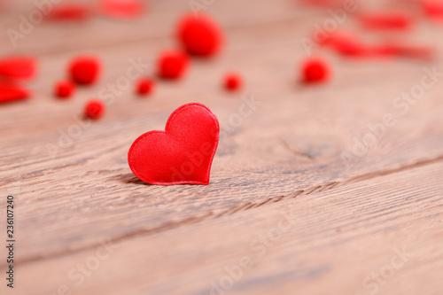Valentine's day red heart on wooden background. Holidays background. Love card. Selective focus