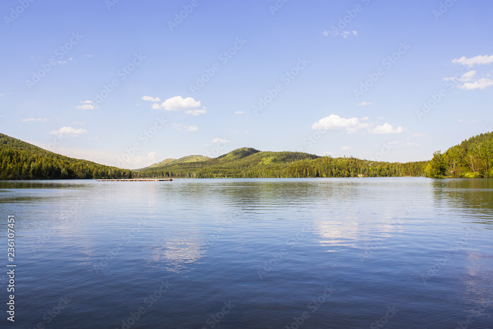 lake in the mountains - summer vacation concept