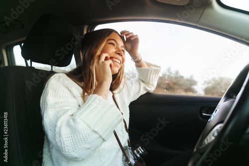 Beautiful young woman talking on mobile phone