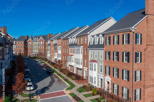 American luxury multi storey town homes, town houses , condos, apartments USA real estate with blue sky aerial view 