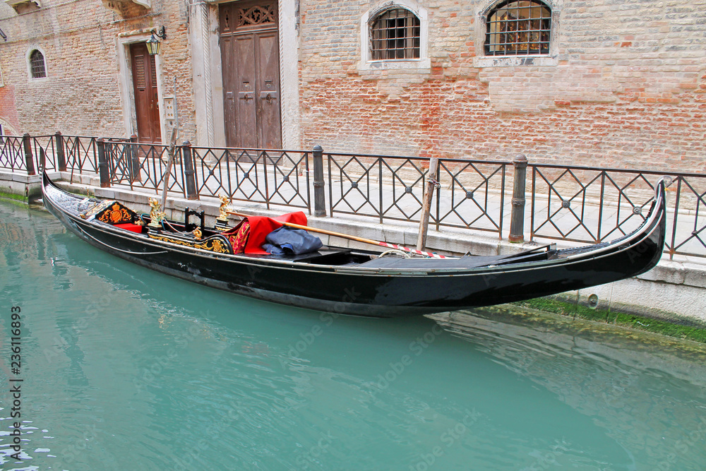 Traditional view of Venice. Gondola along canal. Venice. Italy