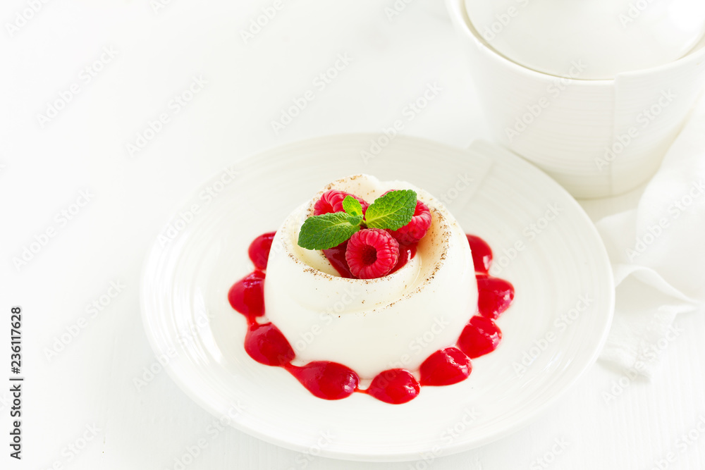 Delicious Italian dessert panna cotta with berries and berry sauce. Valentine's Day. Delicious Italian dessert panna cotta with berries and berry sauce. Valentine's Day.