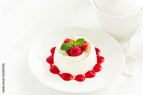 Delicious Italian dessert panna cotta with berries and berry sauce. Valentine s Day.