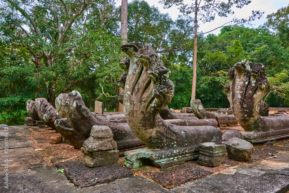SIEM REAP, CAMBODIA - 13 December 2014: Buddhist temple in Angkor thom complex, Angkor Wat Archaeological Park in Siem Reap, Cambodia UNESCO World Heritage Site SIEM REAP, CAMBODIA - 13 December 2014: Buddhist temple in Angkor thom complex, Angkor Wat Archaeological Park in Siem Reap, Cambodia UNESCO World Heritage Site