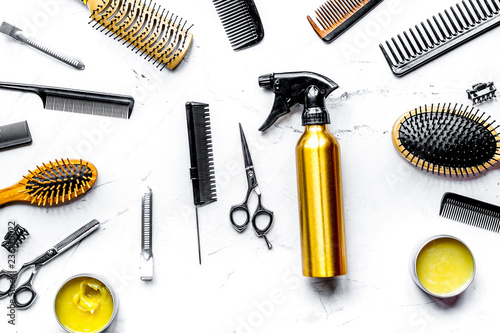 styling hair with tools in barbershop on white background top vi