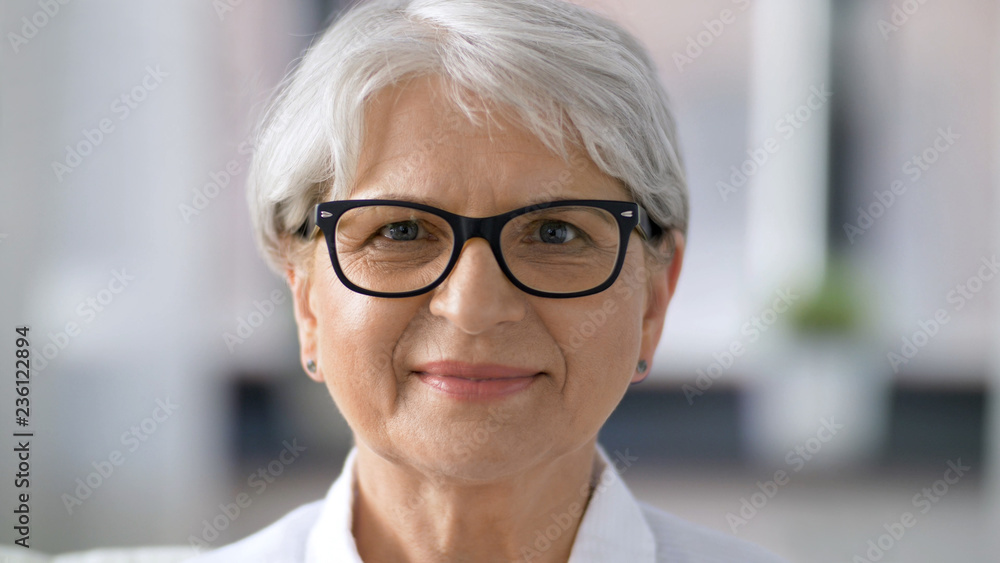 vision, age and people concept - portrait of happy senior woman in glasses vision, age and people concept - portrait of happy senior woman in glasses