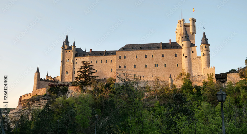 Medieval Segovia castle in Spain at sunset