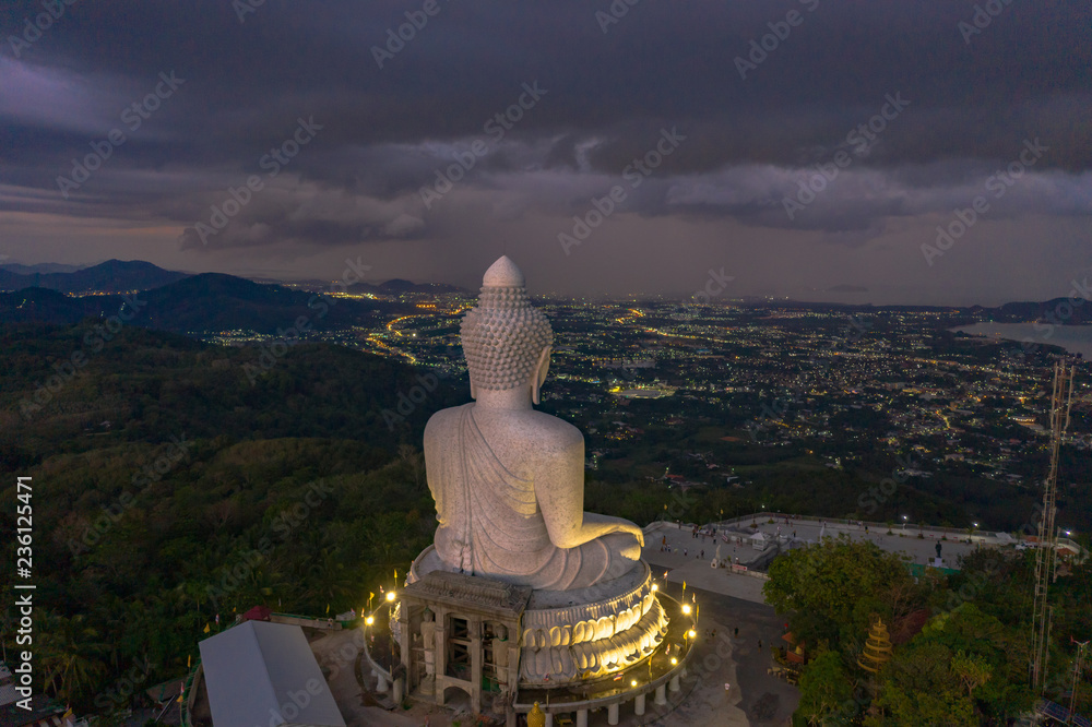 Fototapeta premium aerial view Phuket big Buddha in twilight. Phuket Big Buddha is one of the island most important and revered landmarks on Phuket island..