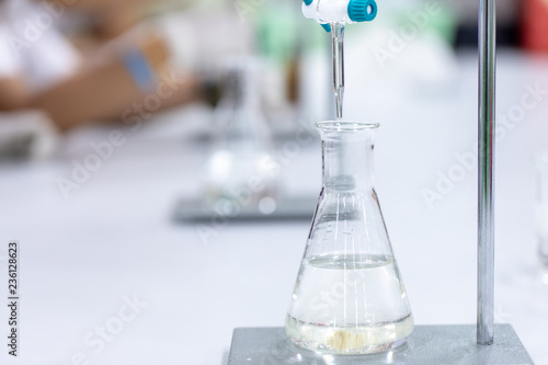 Titration technique in the laboratory.