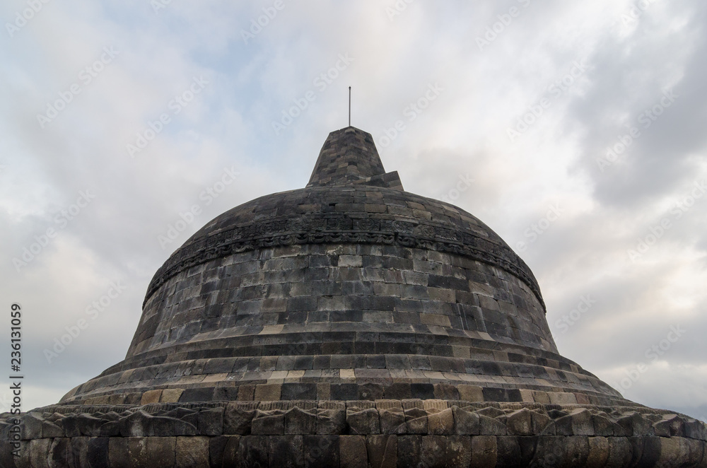 Brahma Vihara Arama in northern Bali is built in the style of the famous Borobudur temple in cloudy day