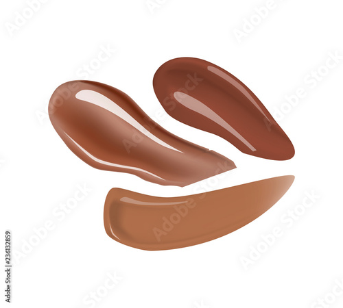 Makeup foundation or concealer smeared smudges isolated on white