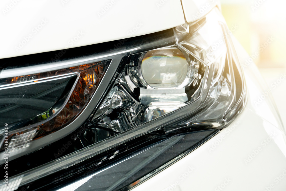 Close up beautiful headlights of luxury car.