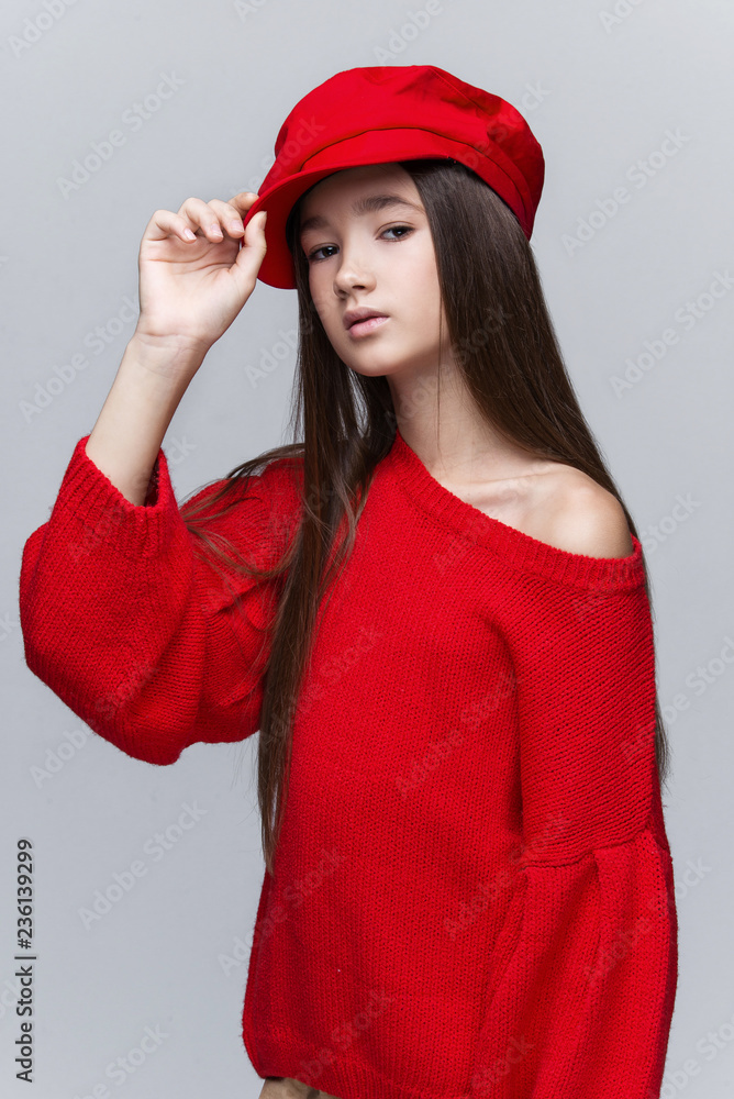 Portrait of beautiful young girl posing in studio. Portrait of beautiful young girl posing in studio.