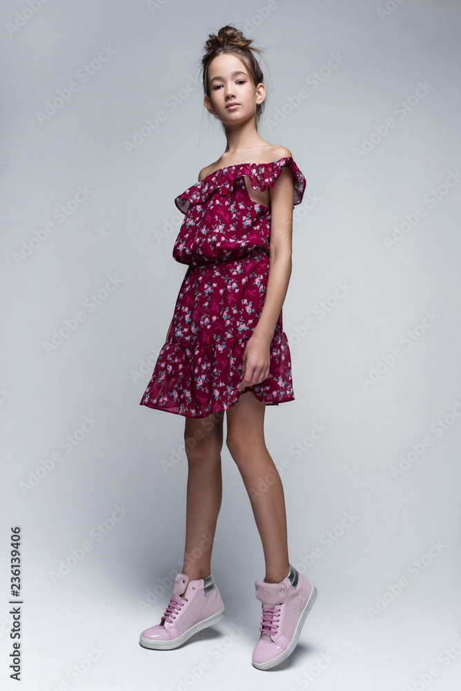 Portrait of beautiful young girl posing in studio. Portrait of beautiful young girl posing in studio.