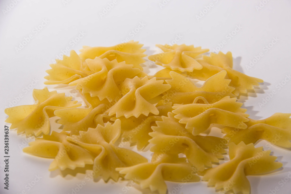 Macaroni bows on white background near Macaroni bows on white background near