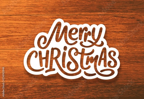 Merry Christmas calligraphy text on paper label