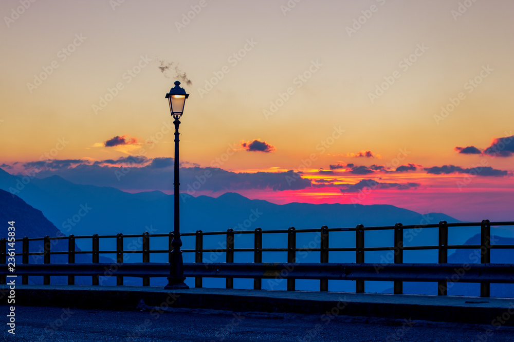 beautiful romantic and atmospheric place of outdoor small city suburb lantern in highland district of country in mountains nature scenery landscape background in evening twilight soft colors time