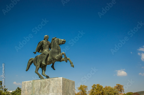 Alexander the great sculpture in Greece city on empty blue sky background