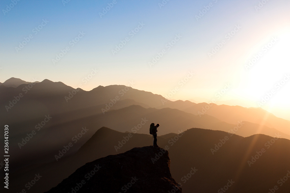 silhouette of man at sunset