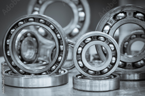 many balls bearing on aluminium floor