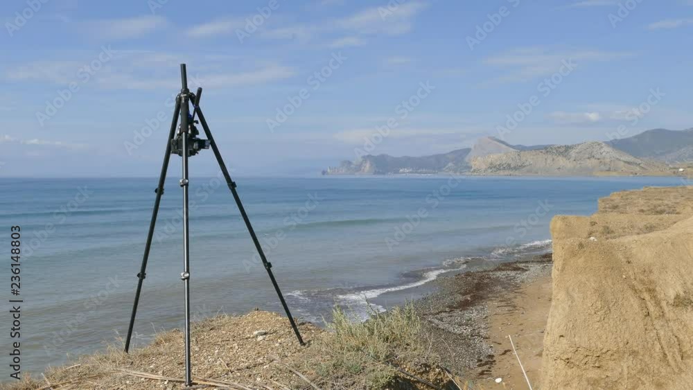 Shooting the coast on a camera mounted on a tripod. BENRO Shooting the coast on a camera mounted on a tripod. BENRO